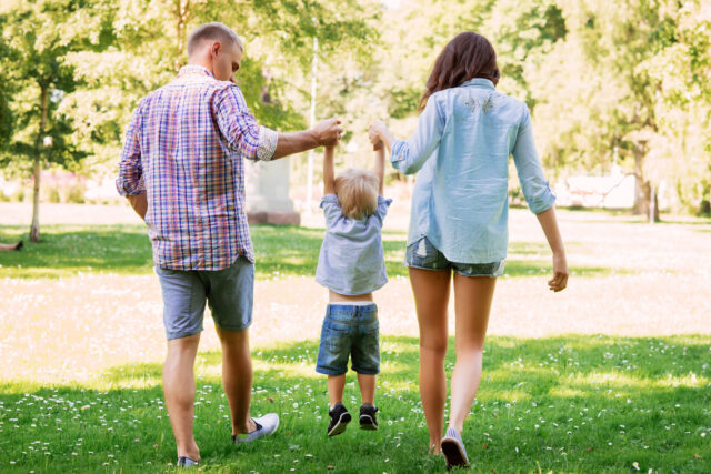 family walking park