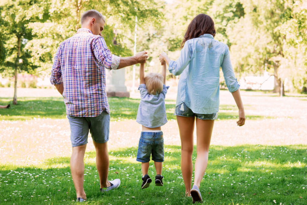 family walking park