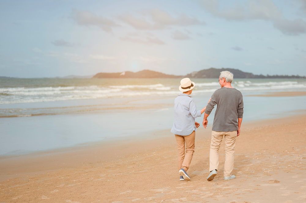 couple walking beach