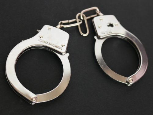 locked handcuffs criminal