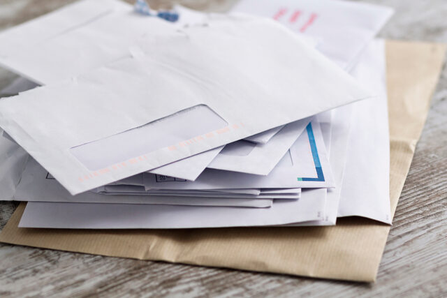 stacked letters mail